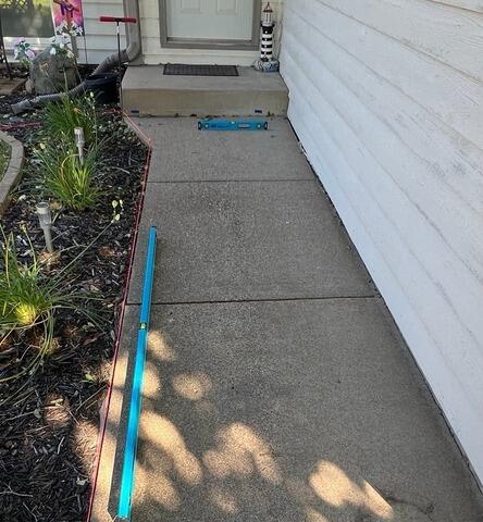 Concrete Heaving Repair in Brooklyn Park, MN - Before Photo