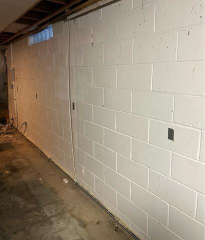 Bowed Foundation Wall Corrected in Mankato, MN - Before Photo