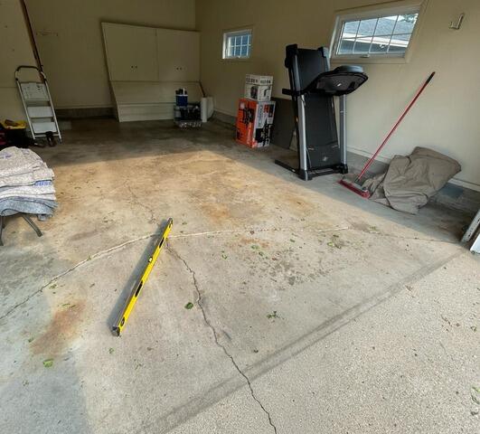 Garage Floor Lifted by PolyLevel in Alexandria, MN - Before Photo