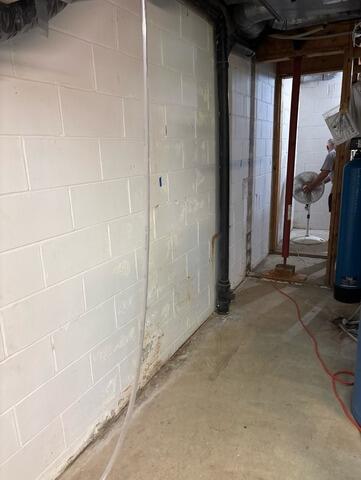 Leaking Floor Waterproofed in Eagan, MN - Before Photo