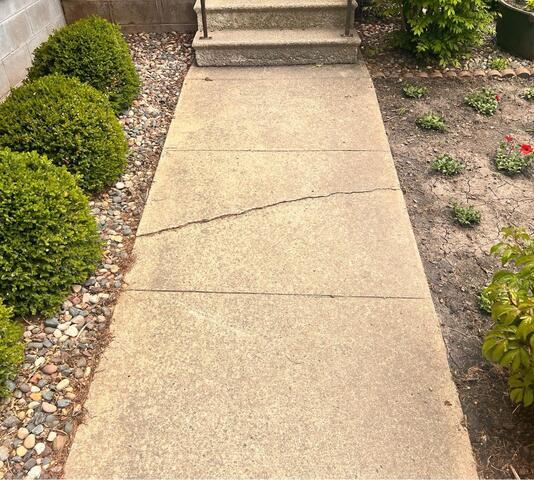 Sinking Walkway Lifted in Northwood, IA - Before Photo