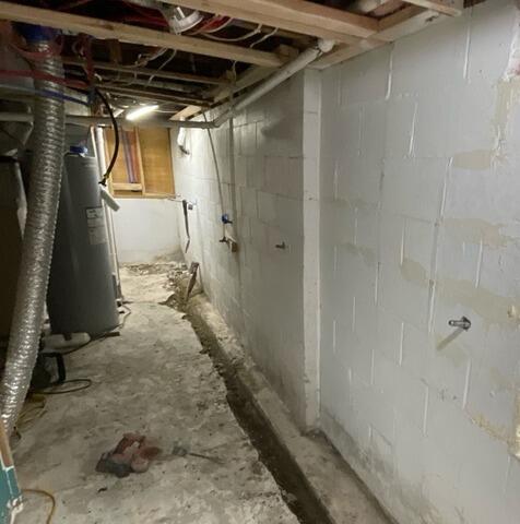 Spring Storms Spur Basement Leaks in Blooming Prairie, MN - Before Photo