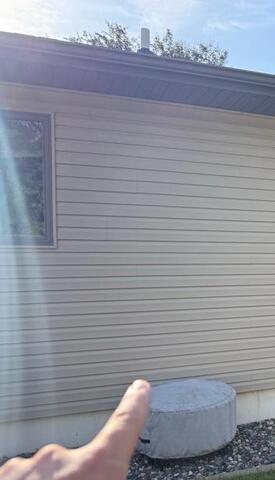 Radon Reduction System Secured in Stacyville, IA - Before Photo