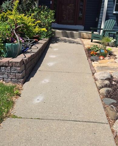 Concrete Walkway Lifting with PolyLevel in Lakeville, MN - Before Photo