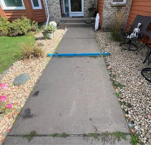 Sunken Walkway in Coon Rapids, MN, Lifted with PolyLevel - Before Photo