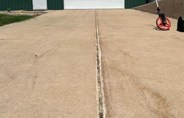 Concrete Driveway Repair in Cresco, IA - Before Photo