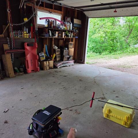Sunken Garage Floor Leveling in La Crosse, WI - Before Photo