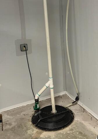 Outdated Sump Pump In New Hampton, IA Replaced - Before Photo