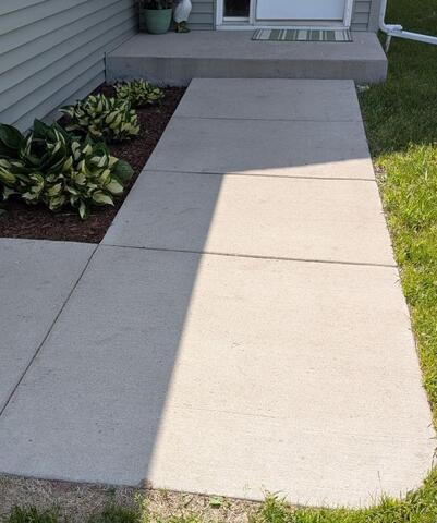 West Fargo, ND, Sinking Walkway Lifted - Before Photo