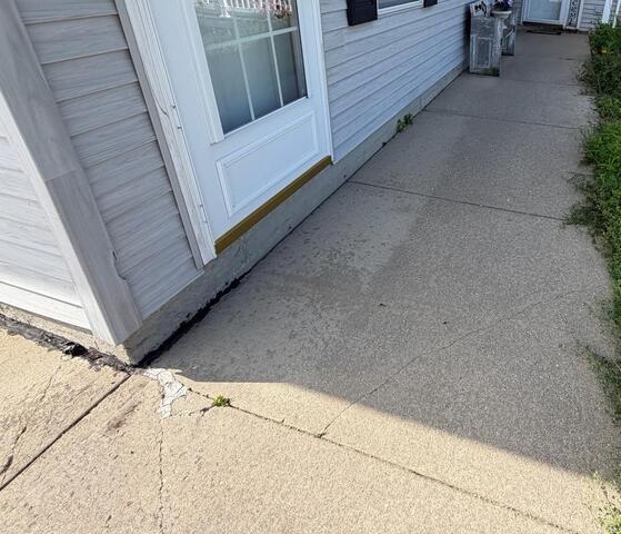 Sinking Walkway Repaired in Houston, MN - Before Photo