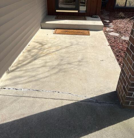 Sinking Concrete Repair in Saint Paul, MN - Before Photo