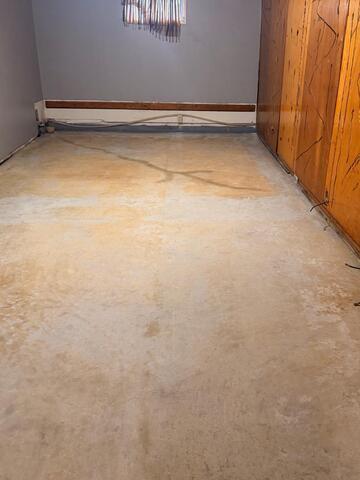Osage, IA, Leaking Basement Repaired and Waterproofed - Before Photo