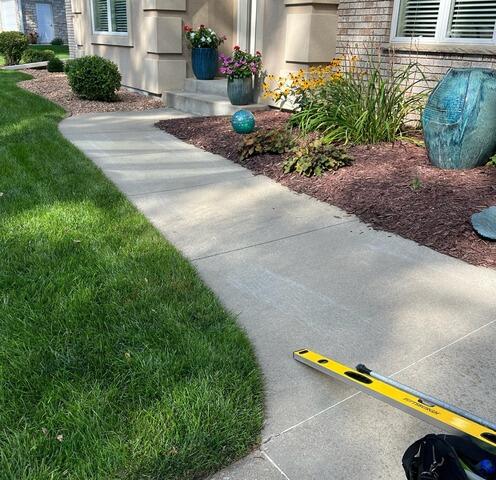Uneven Walkway and Driveway Repair in Rochester, MN - Before Photo