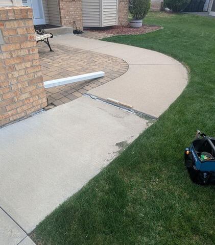 Uneven Concrete Walkway Leveling in Coon Rapids, MN - Before Photo