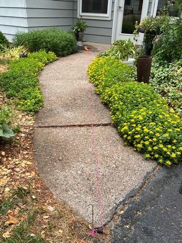 Uneven Walkway Repair with PolyLevel in Menomonie, WI - Before Photo