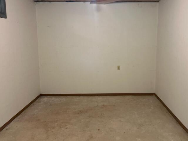 Damp Basement Waterproofed in Elma, IA - Before Photo