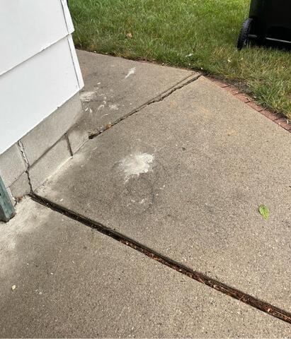 Sinking, Settling Concrete Lifted in Grand Forks, ND - Before Photo