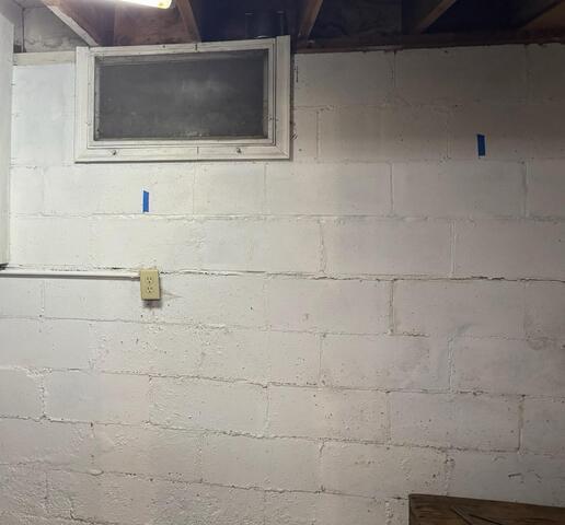 Minneapolis, MN, Damaged Foundation Walls Stabilized and Repaired - Before Photo