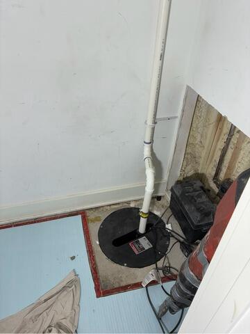 New Sump Installation in Minneapolis, MN Stops Basement Leaks - Before Photo