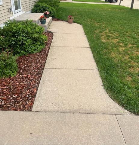 Uneven Walkway and Driveway Repair in Sparta, WI - Before Photo