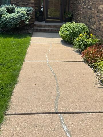 Grand Forks, ND, Lowering Front Walkway Lifted - Before Photo