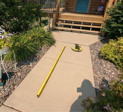 Concrete Leveling on Walkway in Menomonie, WI - Before Photo