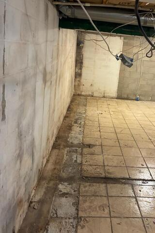 Leaking Basement Repaired in Charles City, IA - Before Photo