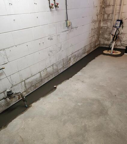 West Union, IA, Leaky Basement Waterproofed and Repaired - After Photo