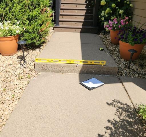 Settling Concrete Repair in Maple Grove, MN - Before Photo