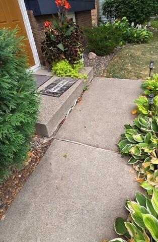Sunken Walkway Lifting and Leveling in Minneapolis, MN - Before Photo