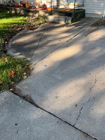 Sinking Front Steps in Charles City, IA, Lifted - Before Photo
