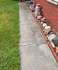 Sinking Walkway Gets Lifted in Elroy, WI