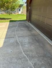 Sinking Driveway Lifted with PolyLevel in Webster, MN