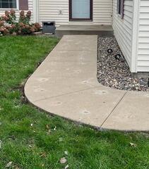 Uneven Walkway Lifted in River Falls, WI