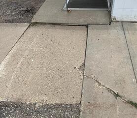 Ellendale, ND, Sinking Sidewalk Repaired and Leveled