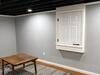 Basement Transformation with New Ceiling & Electrical Panel Concealment