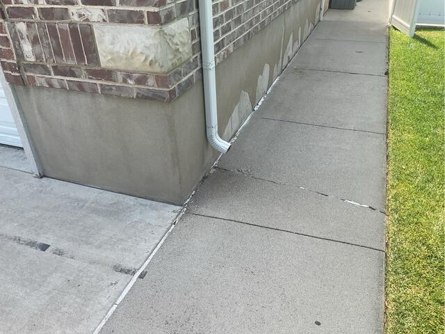 Concrete Walkway Repair and crack/joint sealant with Polylevel and Nexuspro in Highland Utah - Before Photo