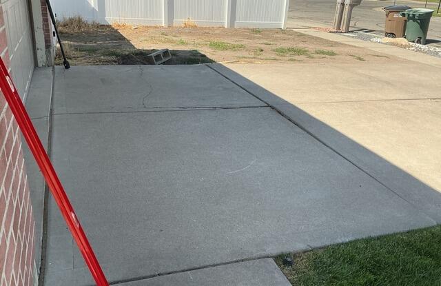 Concrete Driveway Lifting, Leveling and sealing in Salt Lake City, Utah - Before Photo