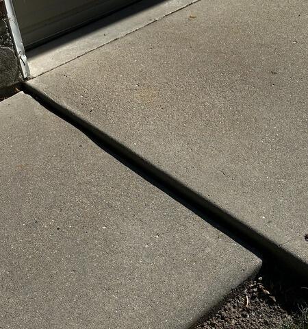 Concrete Walkway Pad leveled and sealed in South Jordan, UT - Before Photo