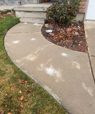 Concrete Walkway Lift & Joint Seal Repair in Murray, UT - Before Photo
