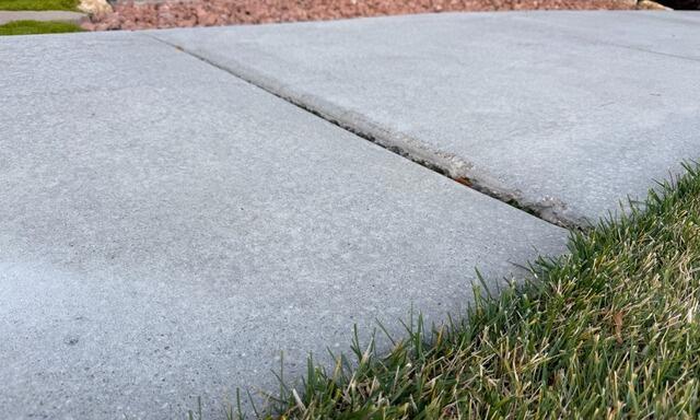 Concrete Slab Leveling and Joint Sealing in Pleasant View, UT Using PolyLevel & NexusPro - Before Photo
