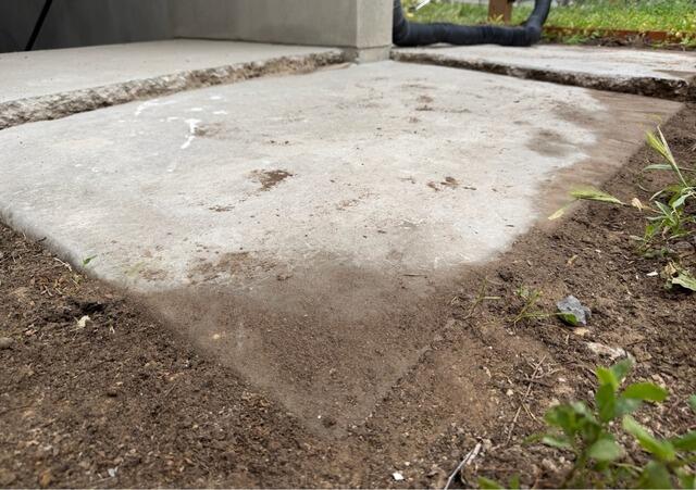 Concrete Leveling and Joint Sealing Around Basement Entry in Stansbury Park, UT - Before Photo