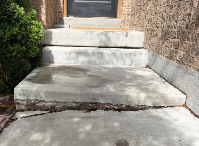 Front Entry Concrete Lifting and Crack Repair in Stansbury Park, UT - Before Photo