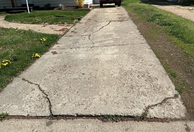Concrete Driveway Repair in Ogden, UT - Before Photo