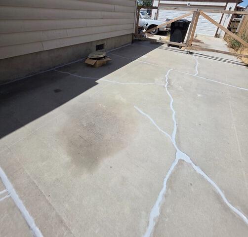 Concrete Leveling and Crack Sealant for a Residential Driveway in Magna, UT