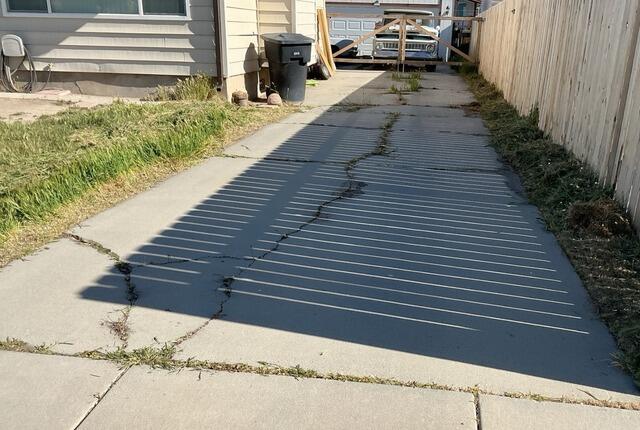 Concrete Leveling and Crack Sealant for a Residential Driveway in Magna, UT