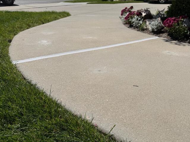 Concrete Sidewalk Repair and Joint Sealant Installation in South Jordan, UT