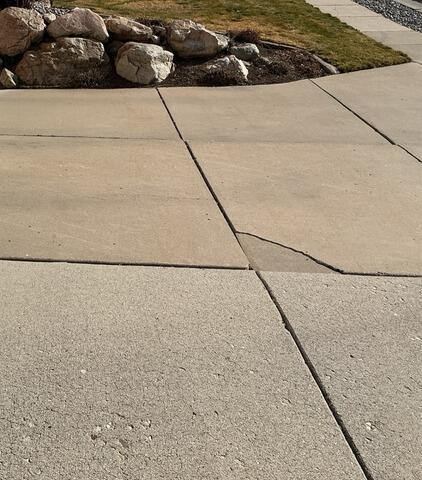 Concrete Driveway Repair, Leveling & Joint Sealant in Farmington, UT - Before Photo