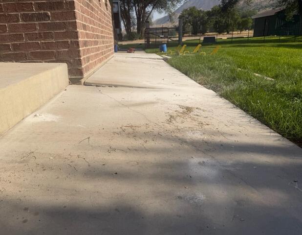 Concrete Walkway Leveling & Repair in Logan, UT - Before Photo