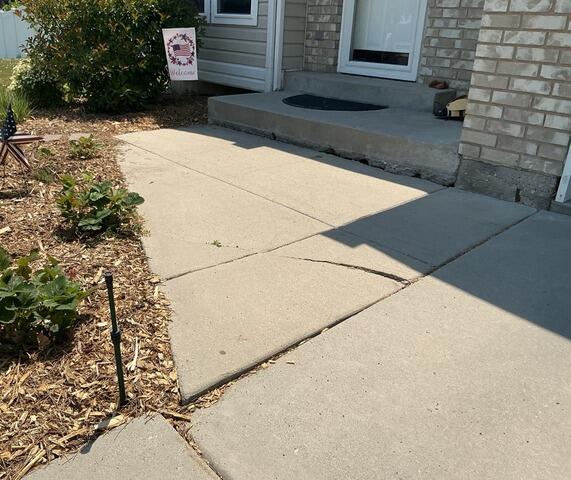 Cracked Concrete Walkway Repair in Riverton, UT - Before Photo